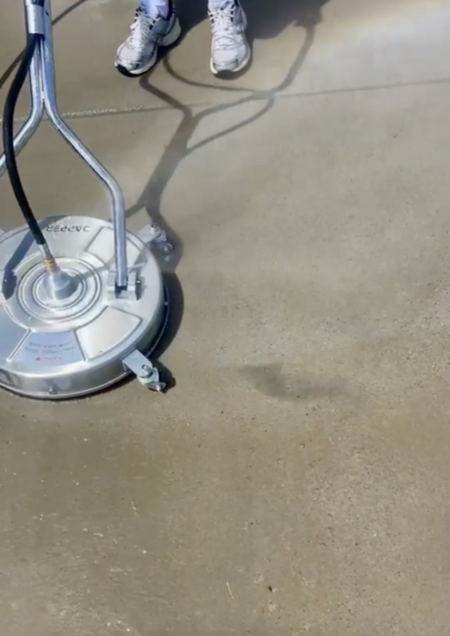 Concrete after a single surface-cleaner pass — clean and even