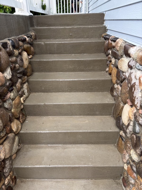 Front steps restored to clean, even concrete